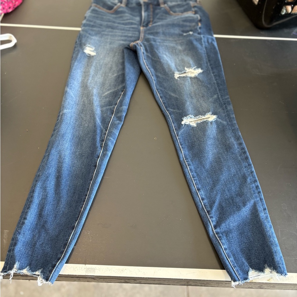 Women's Distressed Blue Jeans